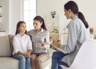 image of a female kid with two adult women