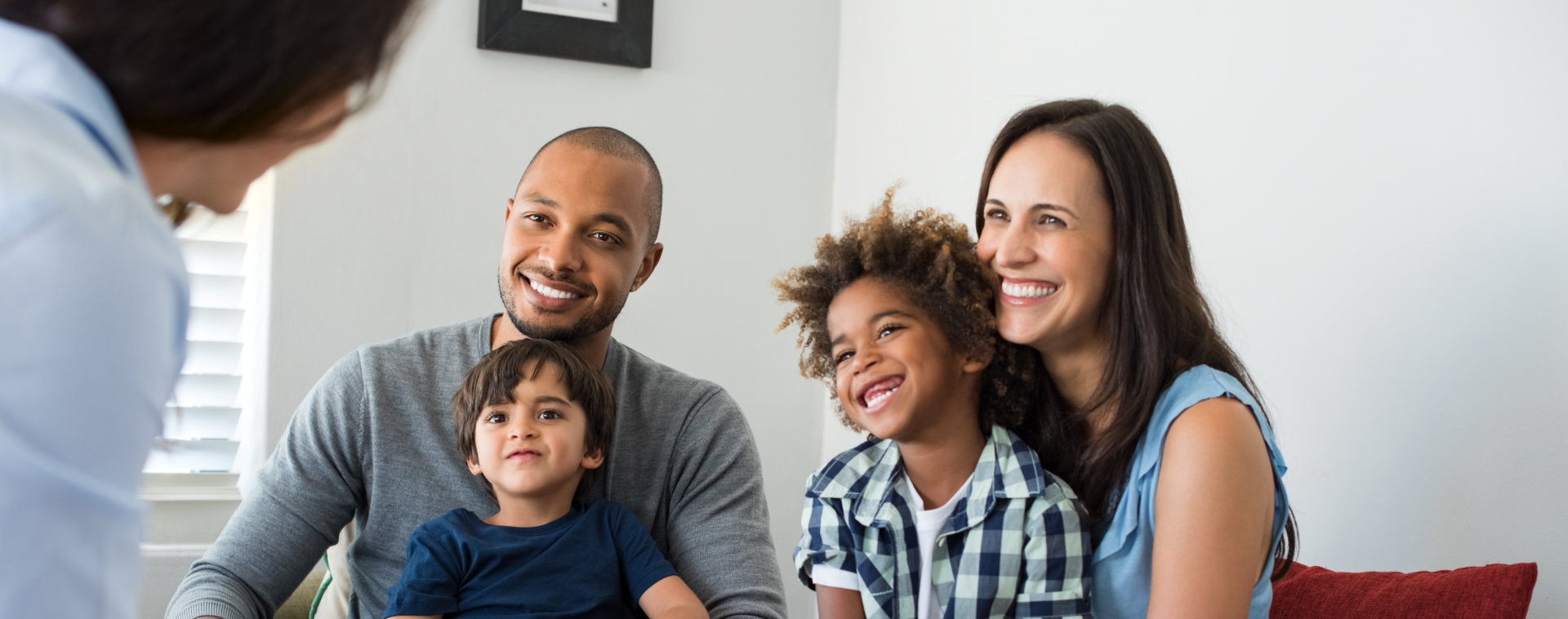 image of a family smiling