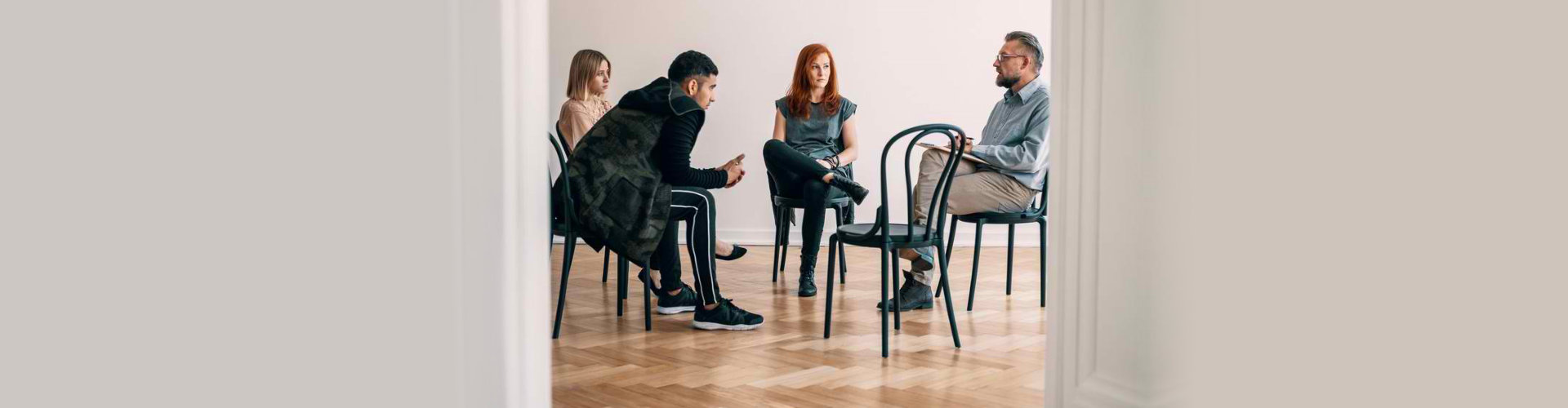 image of four people sitting